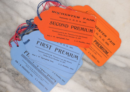 Lot 083 - Grouping Of 10+ Antique Rochester Fair "Premiums" Tags, 1897