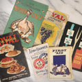 Lot 087 - Grouping Of Six Vintage Booklets Including The Metropolitan Mother Goose, Cook Books, Arm And Hammer Advertisement, First Aid, And More