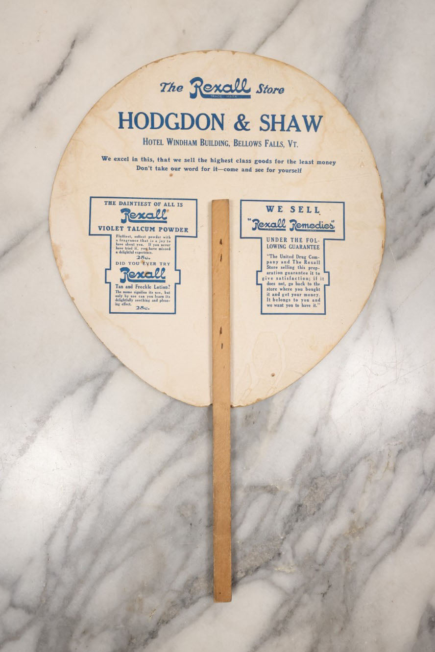 Lot 109 - Antique Advertising Fan With Gibson-Esque Girl In Hat, Scarf, Advertising The Rexall Store, Hodgdon & Shaw, Hotel Windham Building, Bellows Falls, Vermont