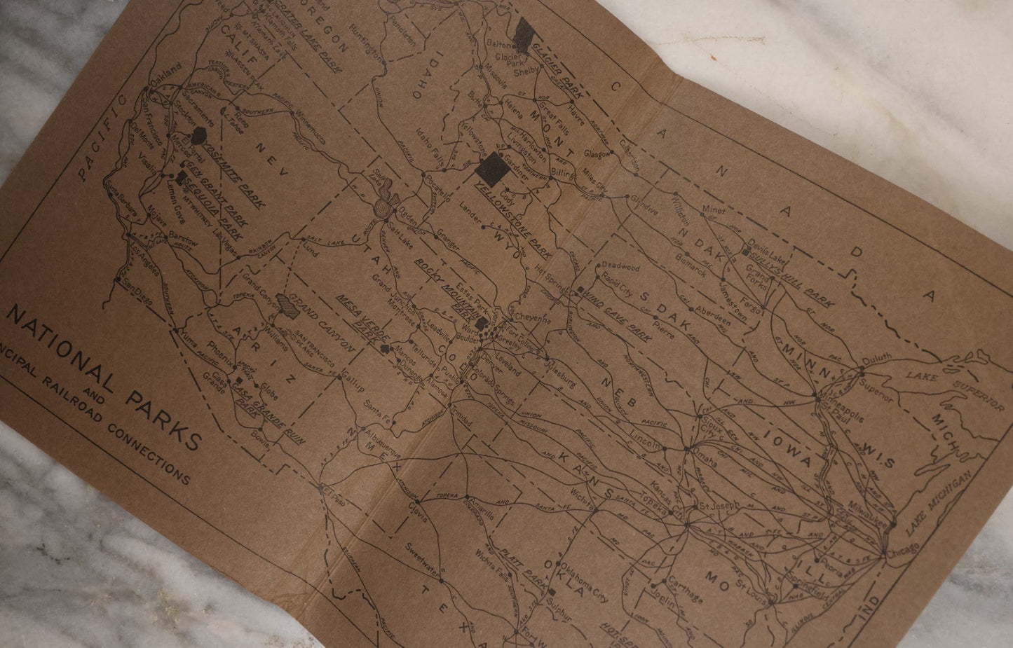 Lot 115 - National Parks Portfolio Folder With Booklets On Mount Rainier, Equoia, And Yellowstone National Parks, Published By The Department Of The Interior