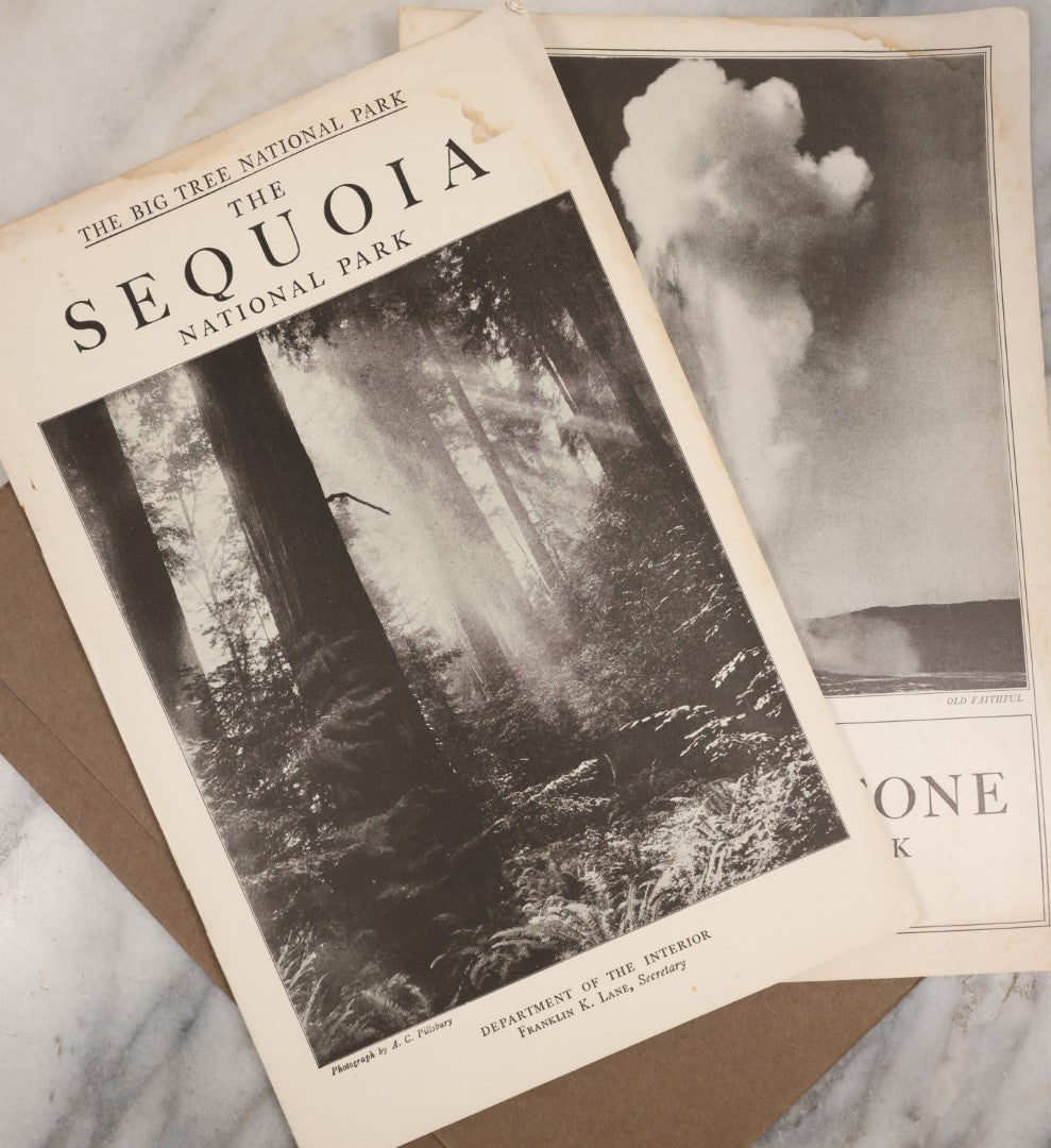 Lot 115 - National Parks Portfolio Folder With Booklets On Mount Rainier, Equoia, And Yellowstone National Parks, Published By The Department Of The Interior