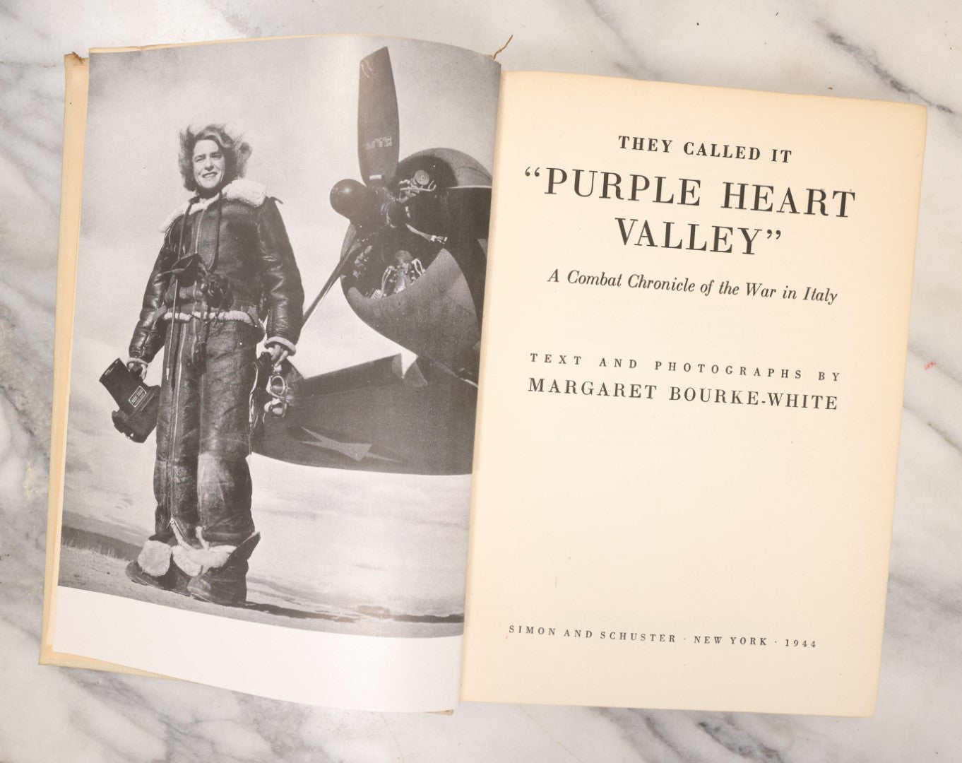 Lot 125 - "They Called It 'Purple Heart Valley': A Combat Chronicle Of The War In Italy" Vintage Book With Text And Photographs By Margaret Bourke-White, World War Two Documentarian And Photographer, Simon And Schuster, New York, 1944, Second Printing