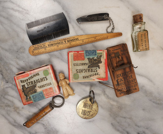 Lot 137 - Junk Drawer Grouping, 10 Vintage And Antique Advertising Pieces And More, Including Egyptienne Straights Cigarette Boxes, Sure Catch Mouse Trap, Dutchy Boy Figure, And More