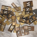 Lot 144 - Junk Drawer Grouping, 20+ Brass Letter And Number Stencils In Box, Incomplete, See Photos
