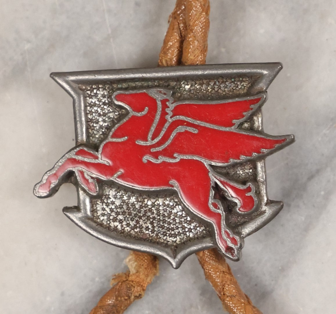 Lot 145 - Single Junk Drawer Finding, Vintage Pegasus Mobil Gas Bolo Tie Slide With Worn, Cracked Bolo Tie