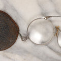 Lot 148 - Single Junk Drawer Finding, Spring Loaded Fold Up Eye Glasses With Case, Note Case Split
