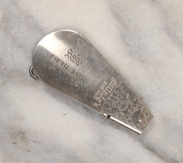 Lot 152 - Single Junk Drawer Finding, Antique Folding Button Hook Tool And Shoehorn, Advertising Saks Fifth Avenue, New York, Patented 10-9-1917