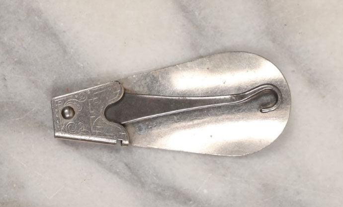 Lot 152 - Single Junk Drawer Finding, Antique Folding Button Hook Tool And Shoehorn, Advertising Saks Fifth Avenue, New York, Patented 10-9-1917