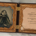 Lot 014 - Antique 1/6th Plate Ambrotype Photograph Of A Woman In A Hooded Cape With Bonnet, In Double Union Case By S. Peck & Co., Manufacturers, Note Scuffs, Scratches To Photo