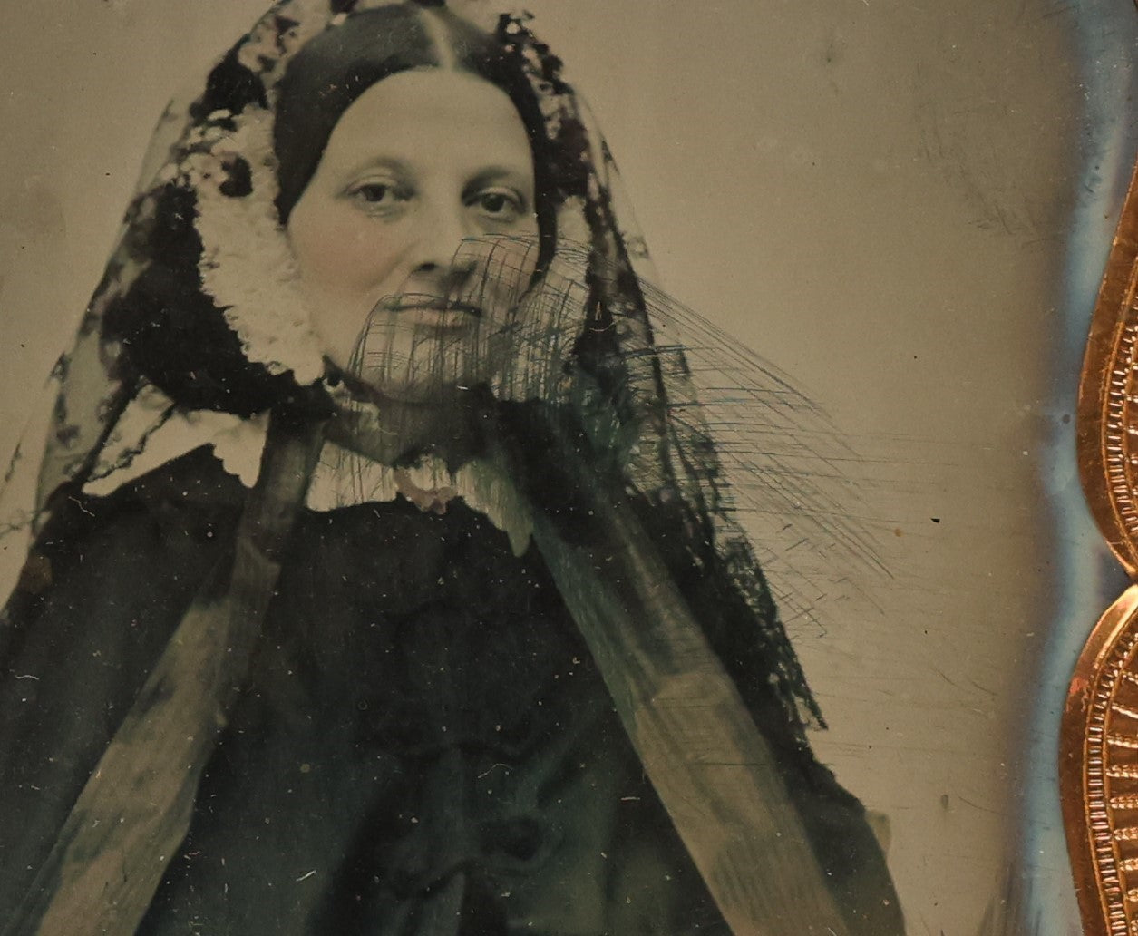 Lot 014 - Antique 1/6th Plate Ambrotype Photograph Of A Woman In A Hooded Cape With Bonnet, In Double Union Case By S. Peck & Co., Manufacturers, Note Scuffs, Scratches To Photo