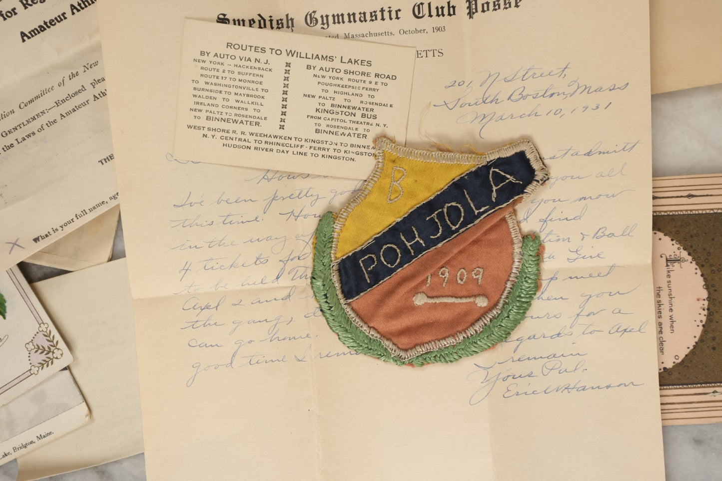 Lot 183 - Estate Ephemera Grouping Related To Boston Swedish Gymnastic Club Posse, Circa 1930s, Including Chocolate Box Found In, Includes Map Of New York City, Real Photo Postcard Of Motorcycle Cop And Boston Marathon, Hand Made Patch, Etc, As Found