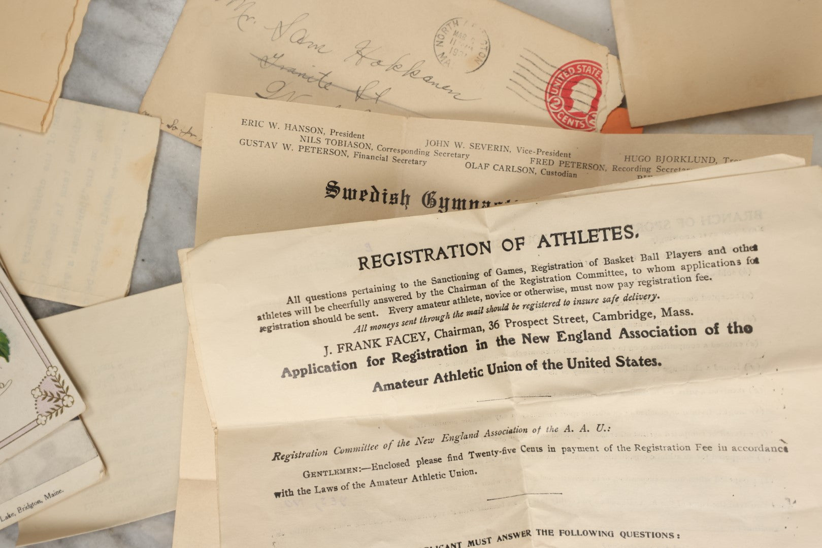 Lot 183 - Estate Ephemera Grouping Related To Boston Swedish Gymnastic Club Posse, Circa 1930s, Including Chocolate Box Found In, Includes Map Of New York City, Real Photo Postcard Of Motorcycle Cop And Boston Marathon, Hand Made Patch, Etc, As Found