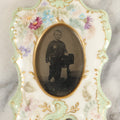 Lot 184 - Antique Tintype Photograph Of A Young Boy In Striped Socks In A Hand Painted Porcelain Frame
