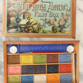 Lot 188 - The Little Artist's Paint Box, Wooden Paint Box With Lithographed Paper Label Containing Unused Blocks Of Water Color Paint With Patriotic Design, Appears To Be Complete, Unused