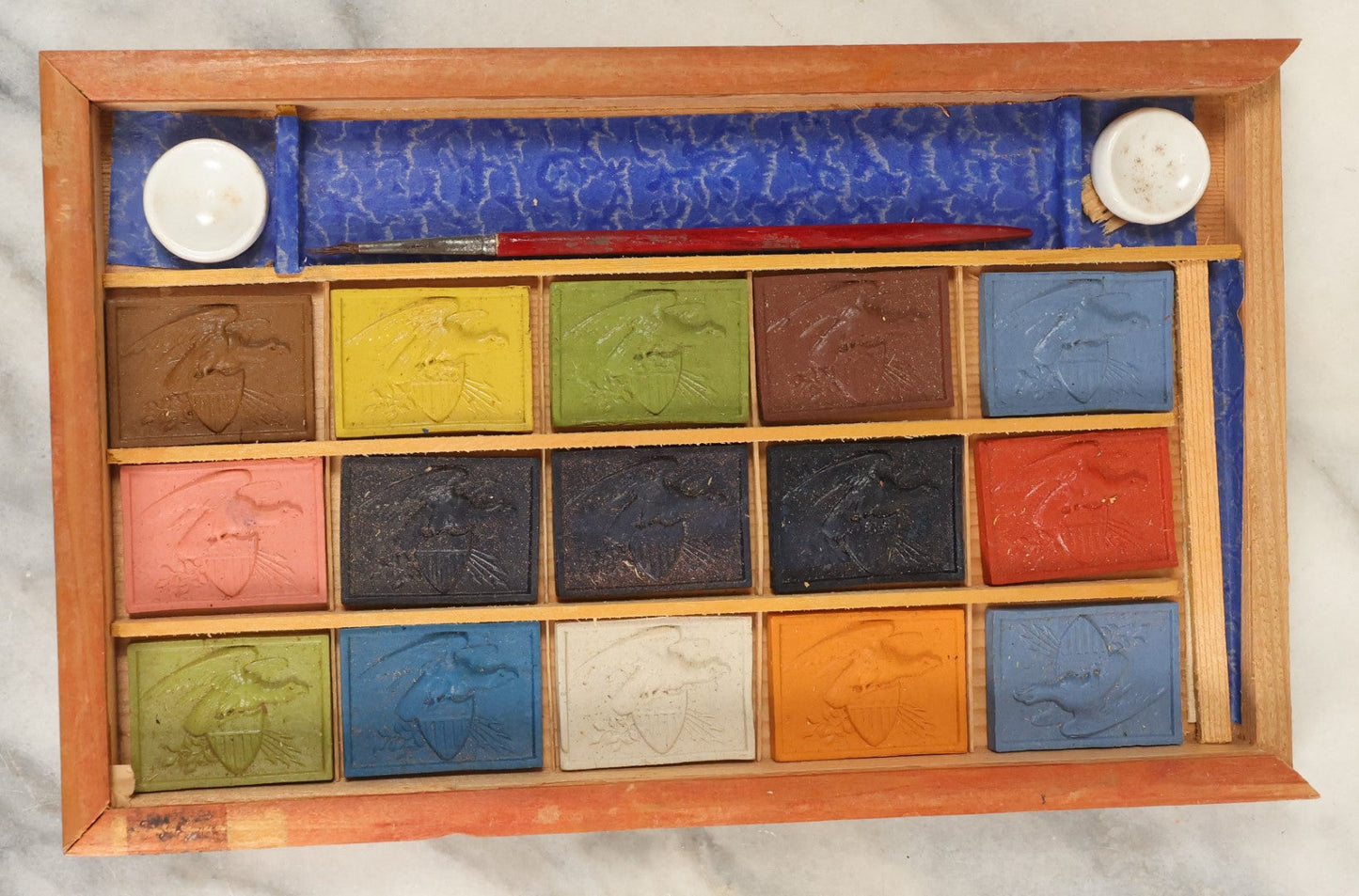 Lot 188 - The Little Artist's Paint Box, Wooden Paint Box With Lithographed Paper Label Containing Unused Blocks Of Water Color Paint With Patriotic Design, Appears To Be Complete, Unused