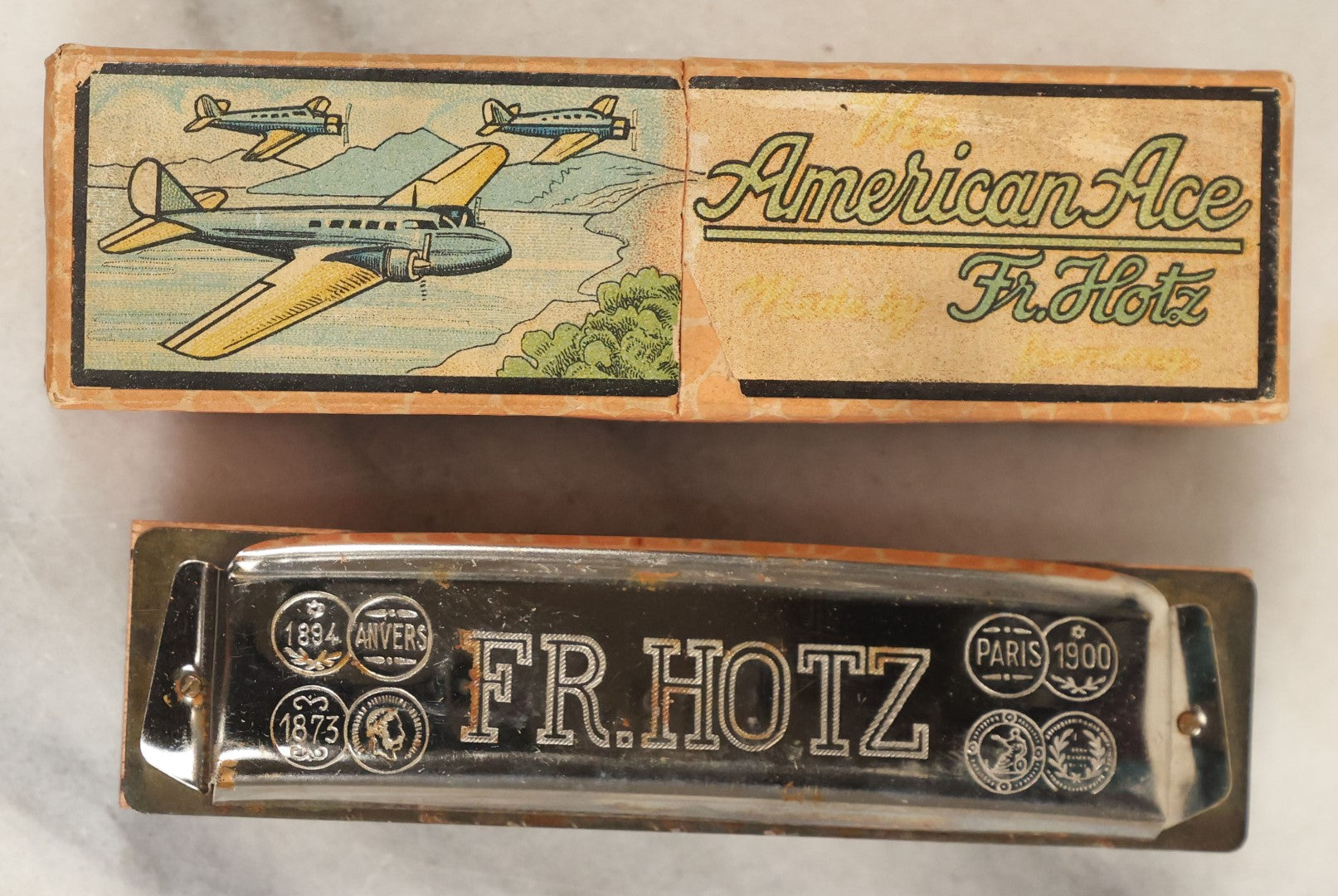 Lot 189 - American Ace Fr. Hotz Harmonica In Original Box With Aeroplanes, Circa 1920