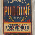 Lot 193 - Flavored Puddine Pudding Powder Mix With Rose Vanilla, By The Fruit Puddine Co., Baltimore, Maryland, Box Is Full, Unopened, Contained In Plastic Baggy, Leaks, Free Sample Box