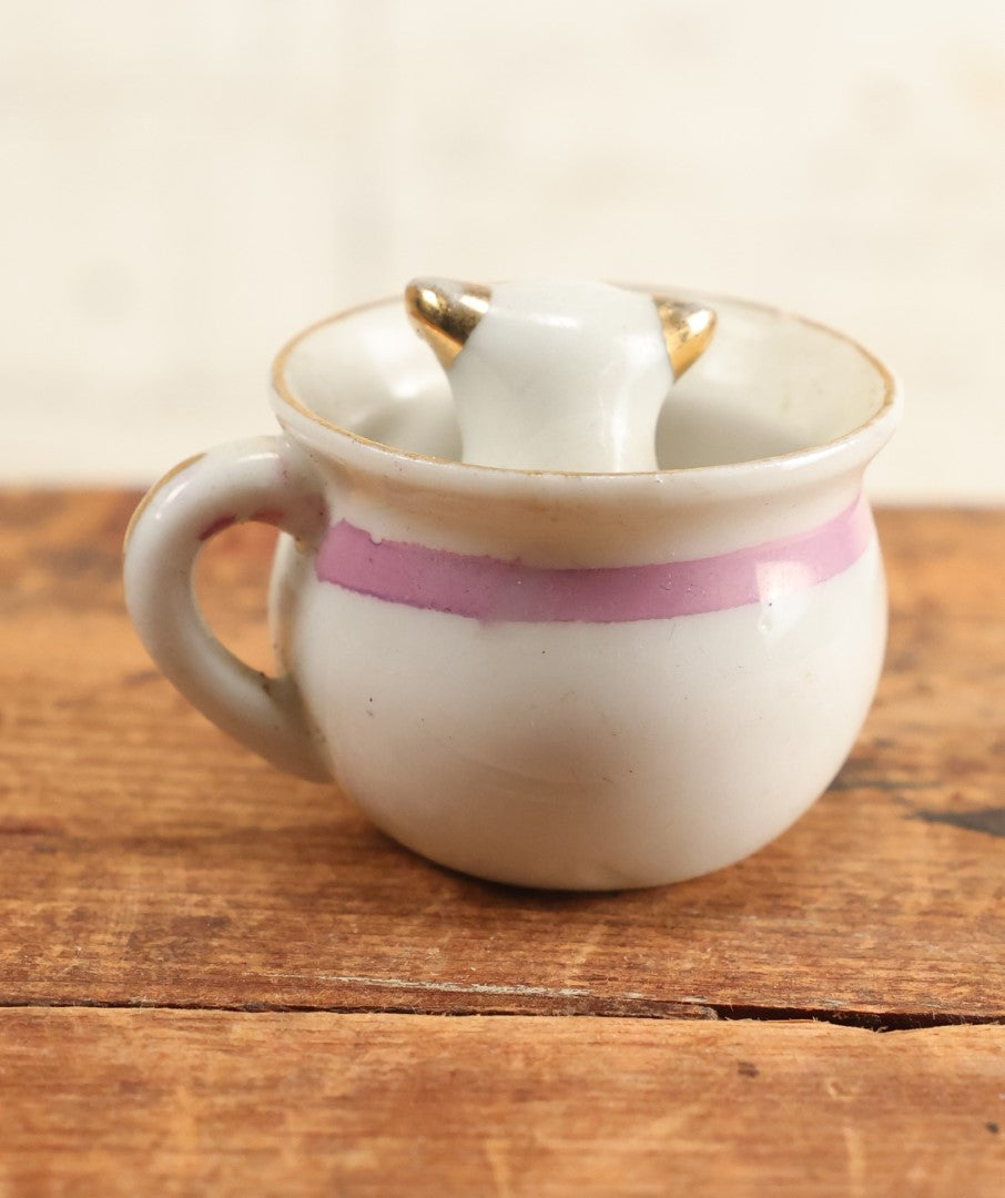 Lot 203 - Morning Exercise Mini Novelty Porcelain Teacup With Little Dog Head Inside