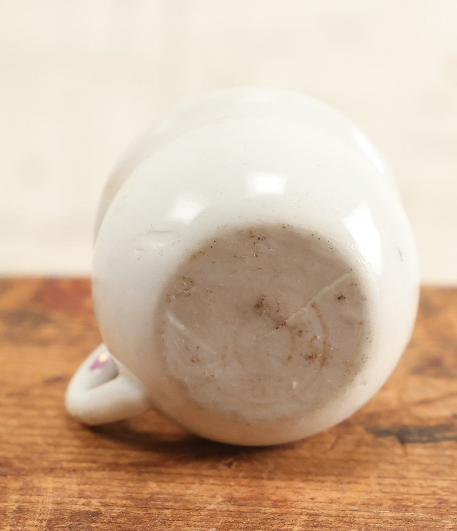 Lot 203 - Morning Exercise Mini Novelty Porcelain Teacup With Little Dog Head Inside