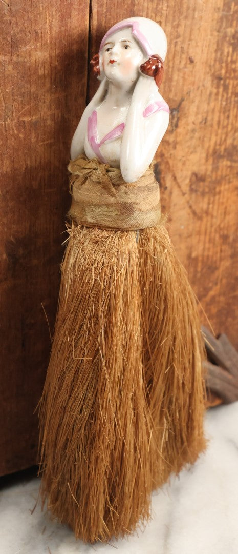 Lot 204 - Porcelain Flapper Woman Straw Dresser Brush, Hand Painted With Pink Detailing, Note Somewhat Loose