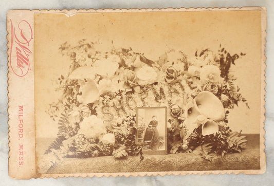 Lot 029 - Antique Cabinet Card Photograph Of A Funeral Flower Arrangement With Picture-In-Picture P.I.P. Of Decedent's Cabinet Card, Flower Arrangement Spells "Shopmate," Willis, Photographer, Milford, Massachusetts