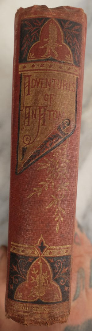 Lot 034 - "Adventures Of An Atom, Its Autobiography, By Itself" Whimsical Antique Book Published Under Pseudonym, "By The Author Of The Dancing Imps Of The Wine," Told From The Point Of View Of An Atom, Copyright 1880 By Hurst & Co.