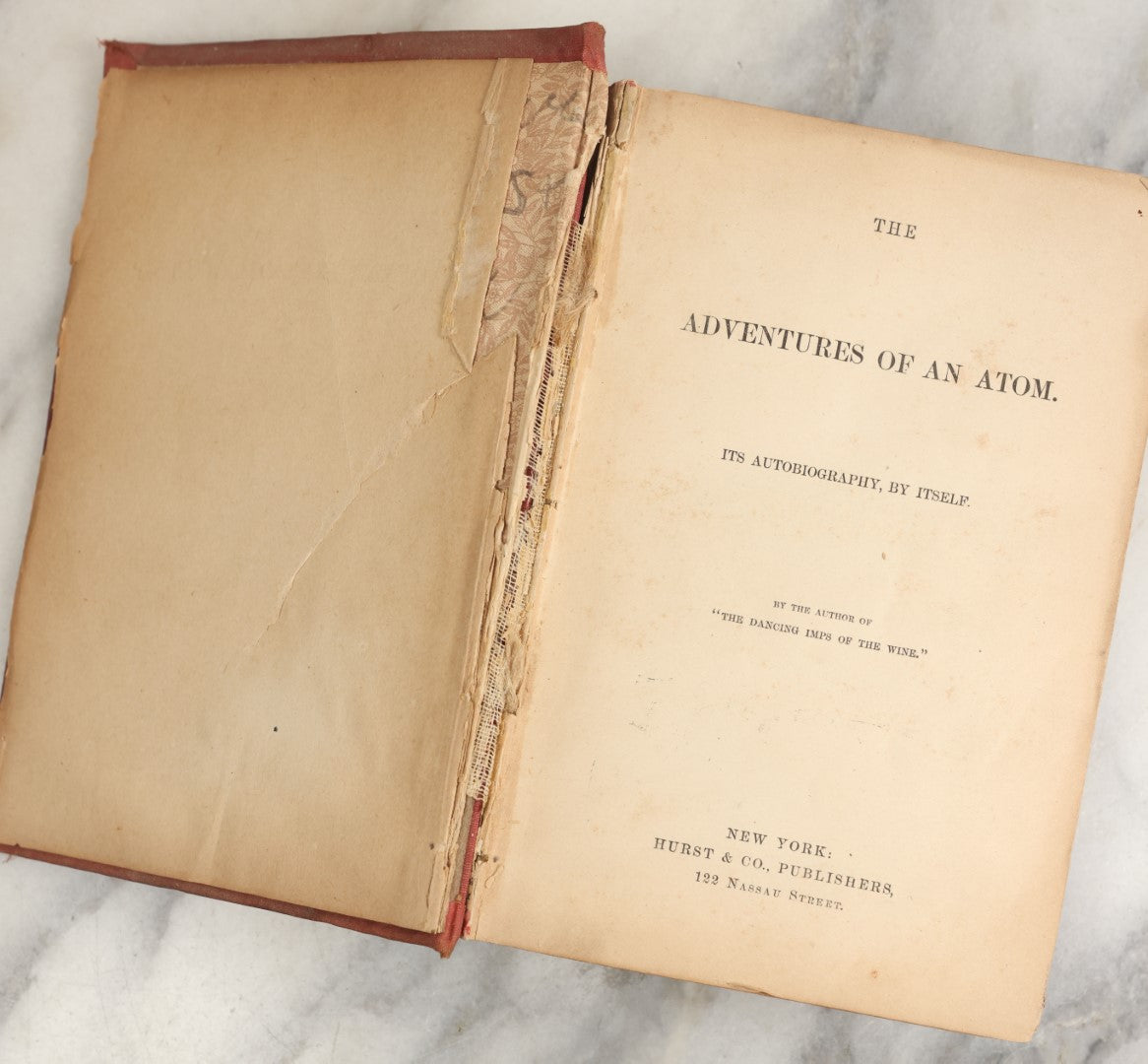 Lot 034 - "Adventures Of An Atom, Its Autobiography, By Itself" Whimsical Antique Book Published Under Pseudonym, "By The Author Of The Dancing Imps Of The Wine," Told From The Point Of View Of An Atom, Copyright 1880 By Hurst & Co.