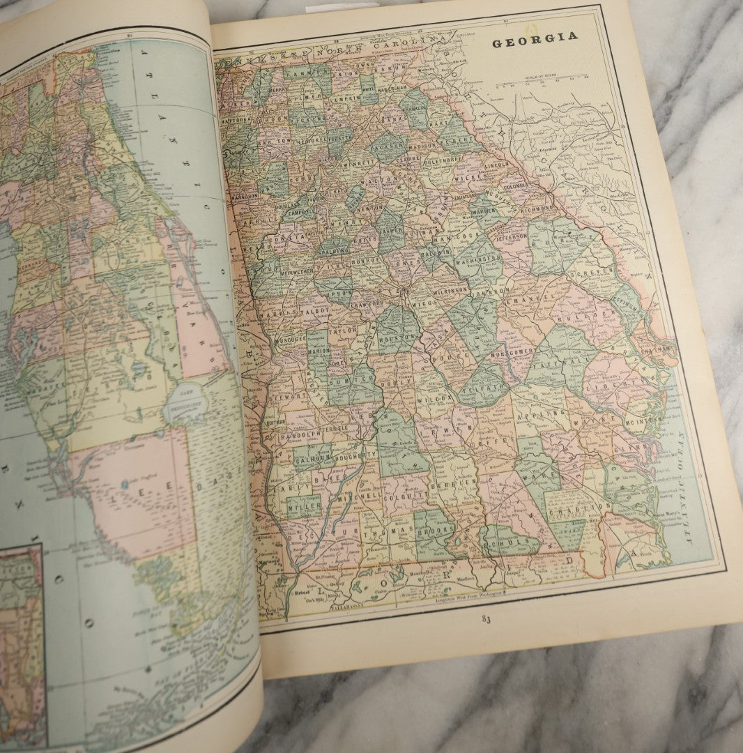 Lot 043 - "Cram's Unrivaled Family Atlas Of The World, Indexed, 1892" Antique Atlas Book Of Maps Including Many Full Color Diagrams And Statistics