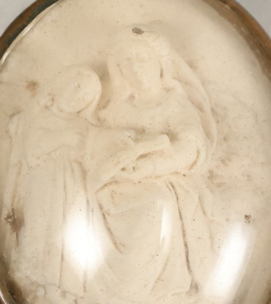 Lot 066 - Antique Small Carved Meerschaum Relief Pendant Behind Bubble Glass, Likely Depicts Saint Anne And Mary