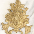 Lot 070 - Antique Cast Metal Gold Painted Fragment With Woman / Goddess' Head, With Ornate Design, Likely A Piece Of A Clock Or Other Decor Item