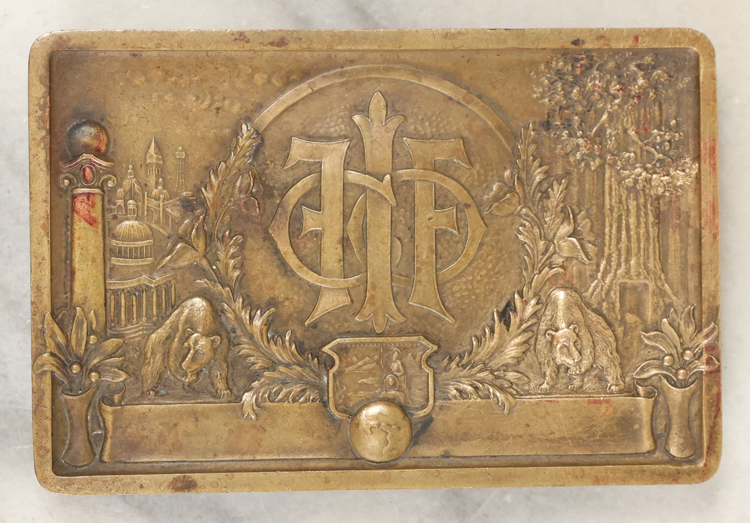 Lot 071 - Antique Small Cast Metal Footed Tray Or Trivet With Bears, Globe, Large Trees, Appears To Be Marked F.I.F. Co., Unknown Origin, Likely Fraternal