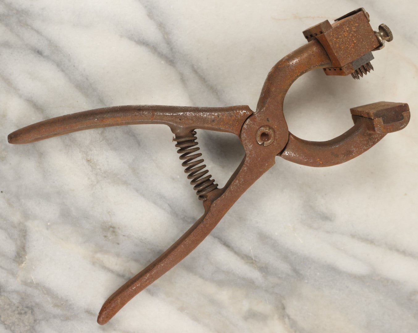 Lot 083 - Vintage Metal Cattle I.D. Tattoo Outfit, Ear Stamper, Brander, By O.M. Franklin Serum Co.