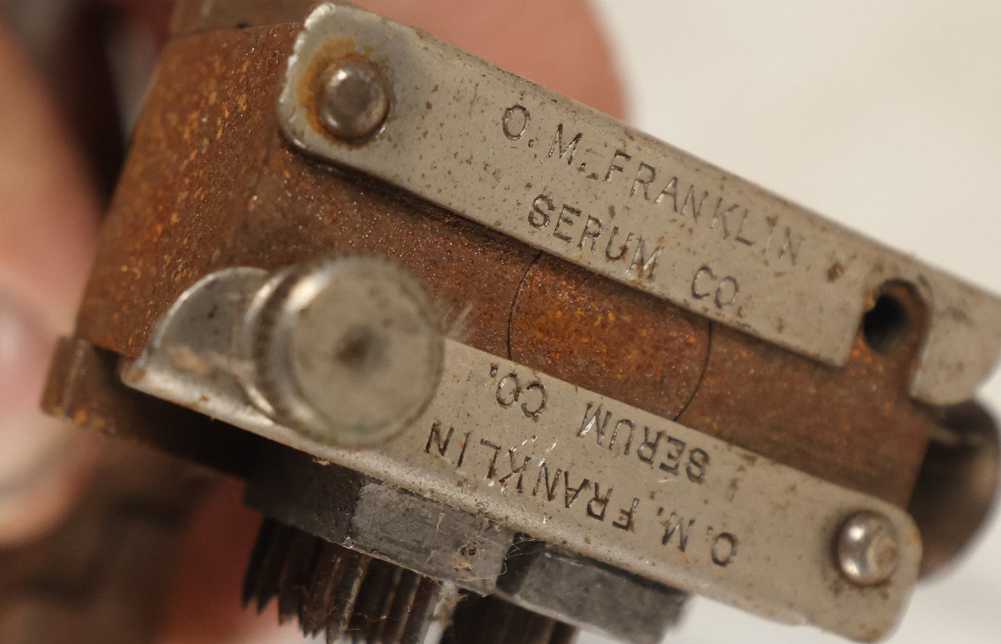 Lot 083 - Vintage Metal Cattle I.D. Tattoo Outfit, Ear Stamper, Brander, By O.M. Franklin Serum Co.