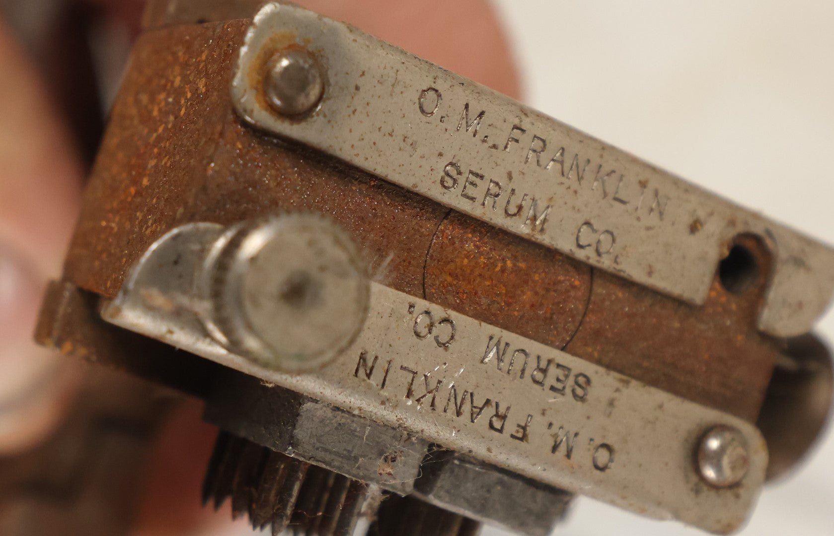 Lot 083 - Vintage Metal Cattle I.D. Tattoo Outfit, Ear Stamper, Brander, By O.M. Franklin Serum Co.