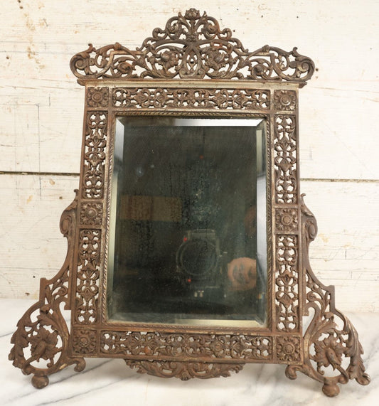 Lot 090 - Antique Ornate Cast Metal Mirror Frame With Beveled Mirror, Kick Stand, Unknown Maker, Note Wear And Crazing To Mirror