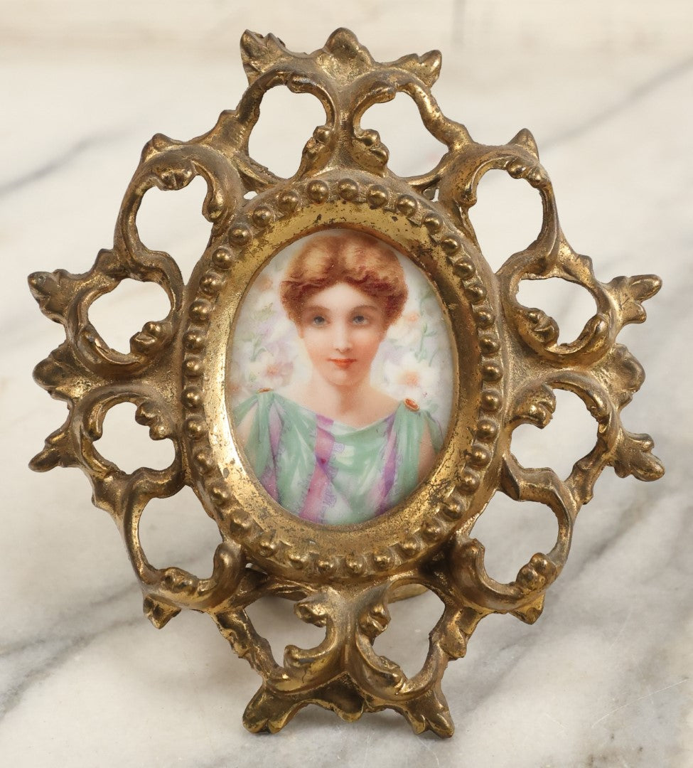 Lot 095 - Antique Hand Painted Porcelain Tile Of Woman With Teal And Purple Robe In Ormolu Brass Frame, Stamp On Verso