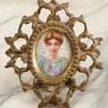 Lot 095 - Antique Hand Painted Porcelain Tile Of Woman With Teal And Purple Robe In Ormolu Brass Frame, Stamp On Verso