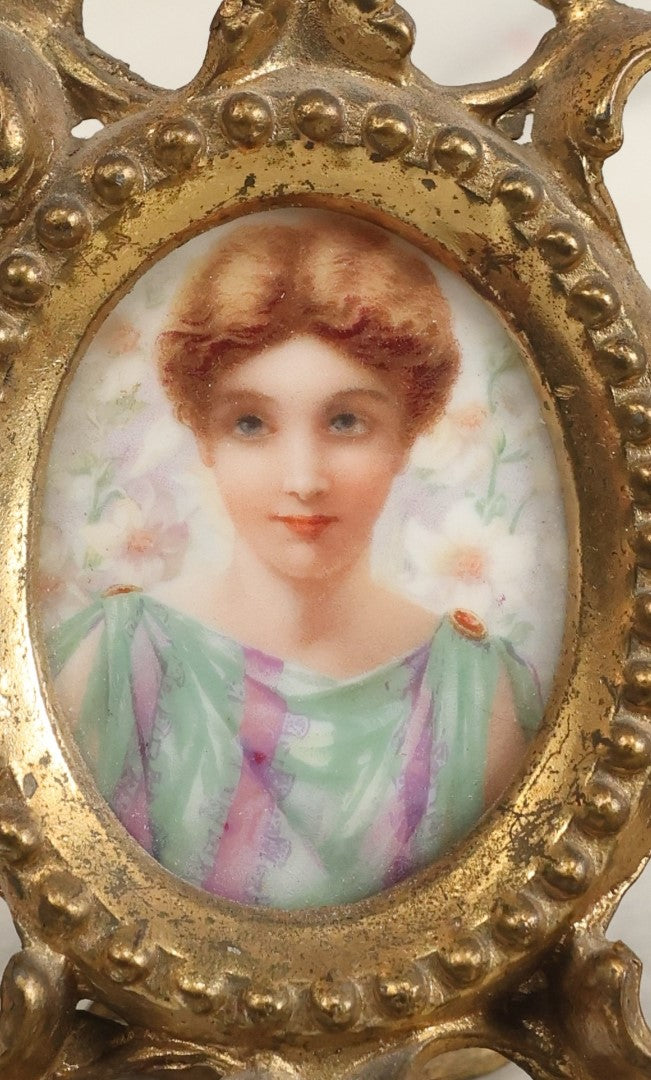 Lot 095 - Antique Hand Painted Porcelain Tile Of Woman With Teal And Purple Robe In Ormolu Brass Frame, Stamp On Verso