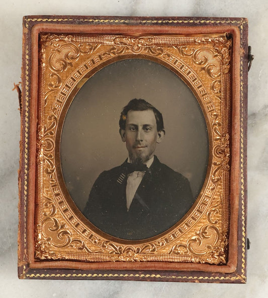 Lot 109 - Antique 1/6th Plate Ambrotype Of A Young Man With Big Dark Eyes And Slight Smile, Small Beard, In Half Leatherette Case