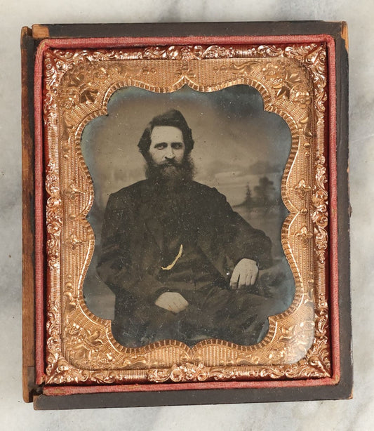 Lot 111 - Antique 1/6th Plate Ambrotype Photograph Of A Dark Dressed Man With A Full Wispy Beard And Mustache, Watch Chain, In Half Leatherette Case