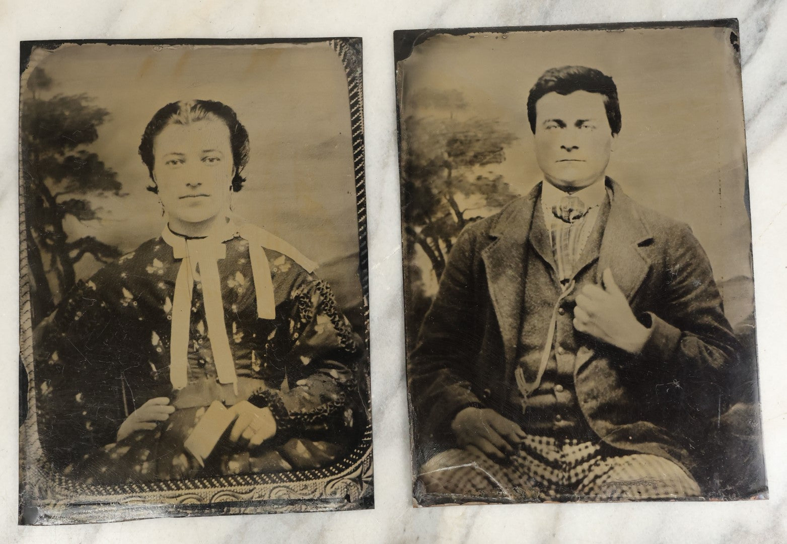 Lot 119 - Pair Of Approximately Half Plate Tintypes Of A Man And Women, Likely A Couple, Note Woman Holding Small Book, One Lot One Money