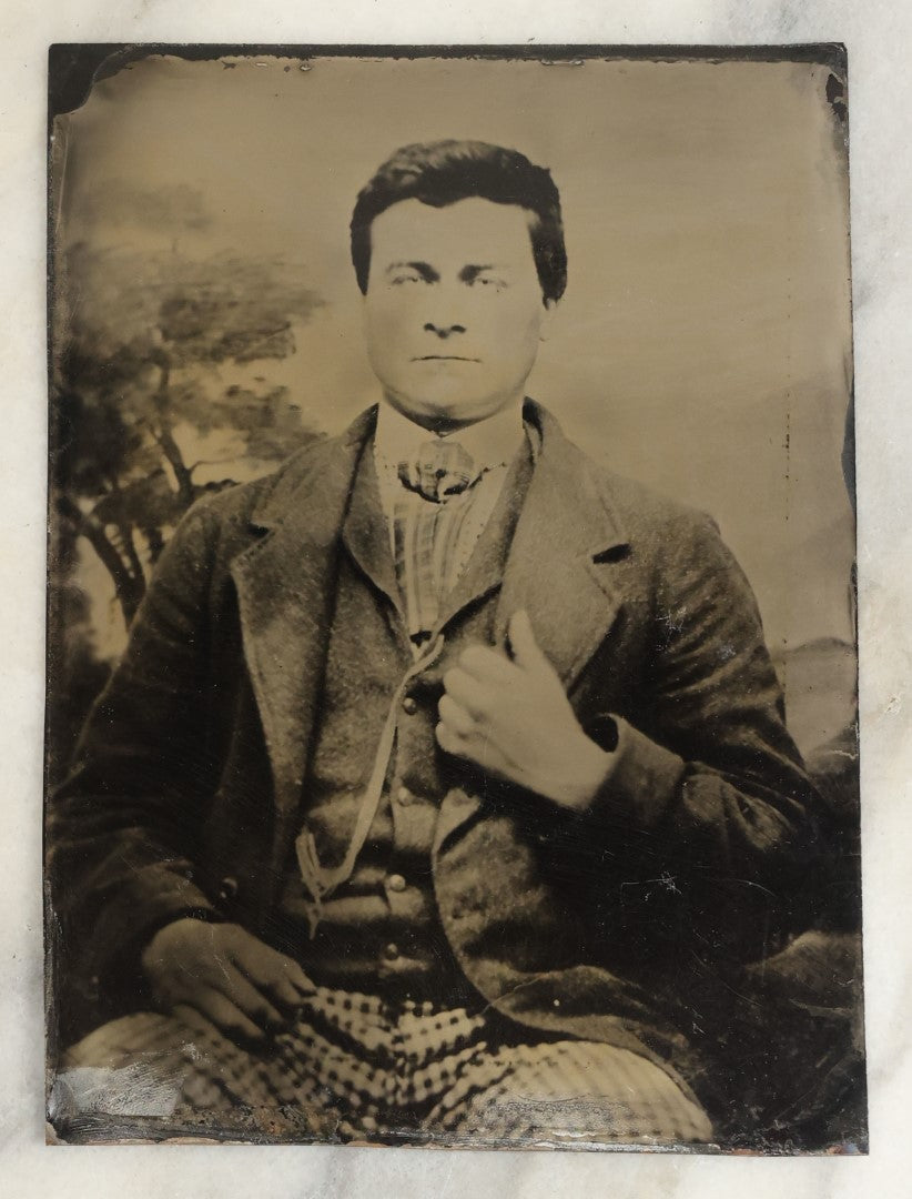 Lot 119 - Pair Of Approximately Half Plate Tintypes Of A Man And Women, Likely A Couple, Note Woman Holding Small Book, One Lot One Money