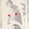 Lot 129 - Vintage Nude Pinup Black And White Photo Of A Topless Blond Women Behind Set Piece, Circa 1940s