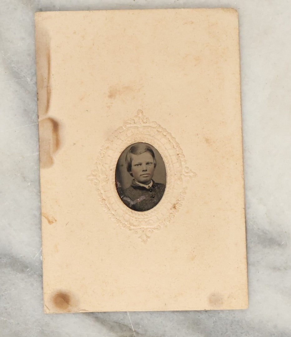 Lot 131 - Grouping Of Seven Antique Tintype Photographs Of Babies And Children, Including Smiling Baby With Tinted Yellow Waist Ribbon, Toddler In Winter Clothes With Gloves, And More