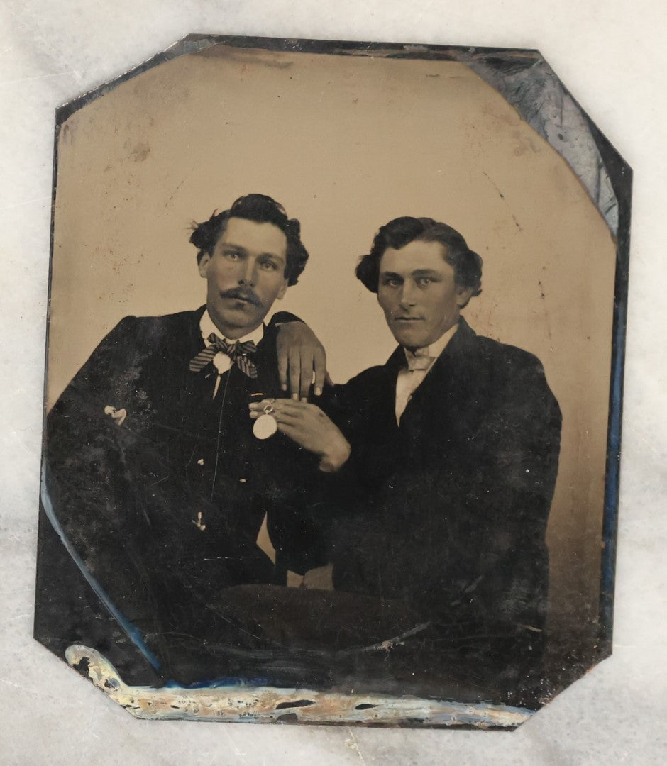 Lot 133 - Grouping Of Four Antique Tintype Photographs Of Men Together, Including Man And Friend Showing Off Watch, And Others