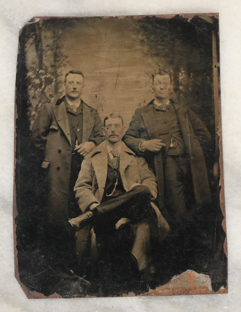 Lot 133 - Grouping Of Four Antique Tintype Photographs Of Men Together, Including Man And Friend Showing Off Watch, And Others
