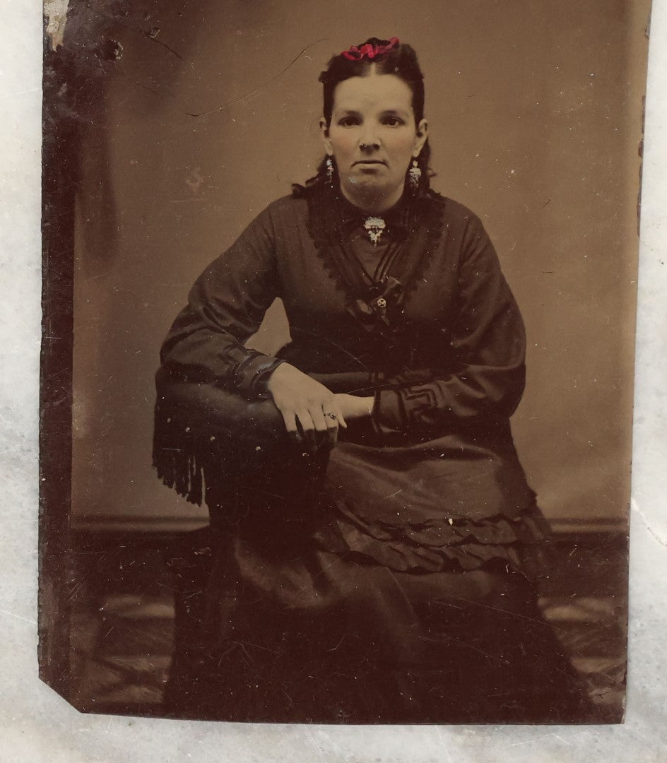 Lot 135 - Grouping Of Six Antique Tintype Photographs Of Pretty Young Women, Including Smiling Woman With Tinted Bow Holding Photo Album
