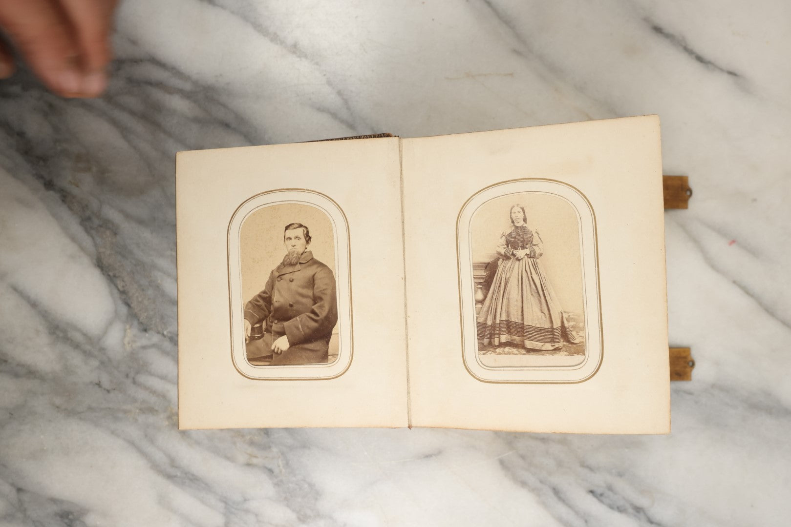 Lot 144 - Antique Photo Album With Gold Lettering On Spine, Gold On Cover, Containing Four Tintypes, 10 Carte De Visite, And 25 Snapshot Photos Of The Patterson Family, 19th / Early 20th Century, Including C.D.V. Of Little Girl Playing Piano (All Pages Included In Pictures)