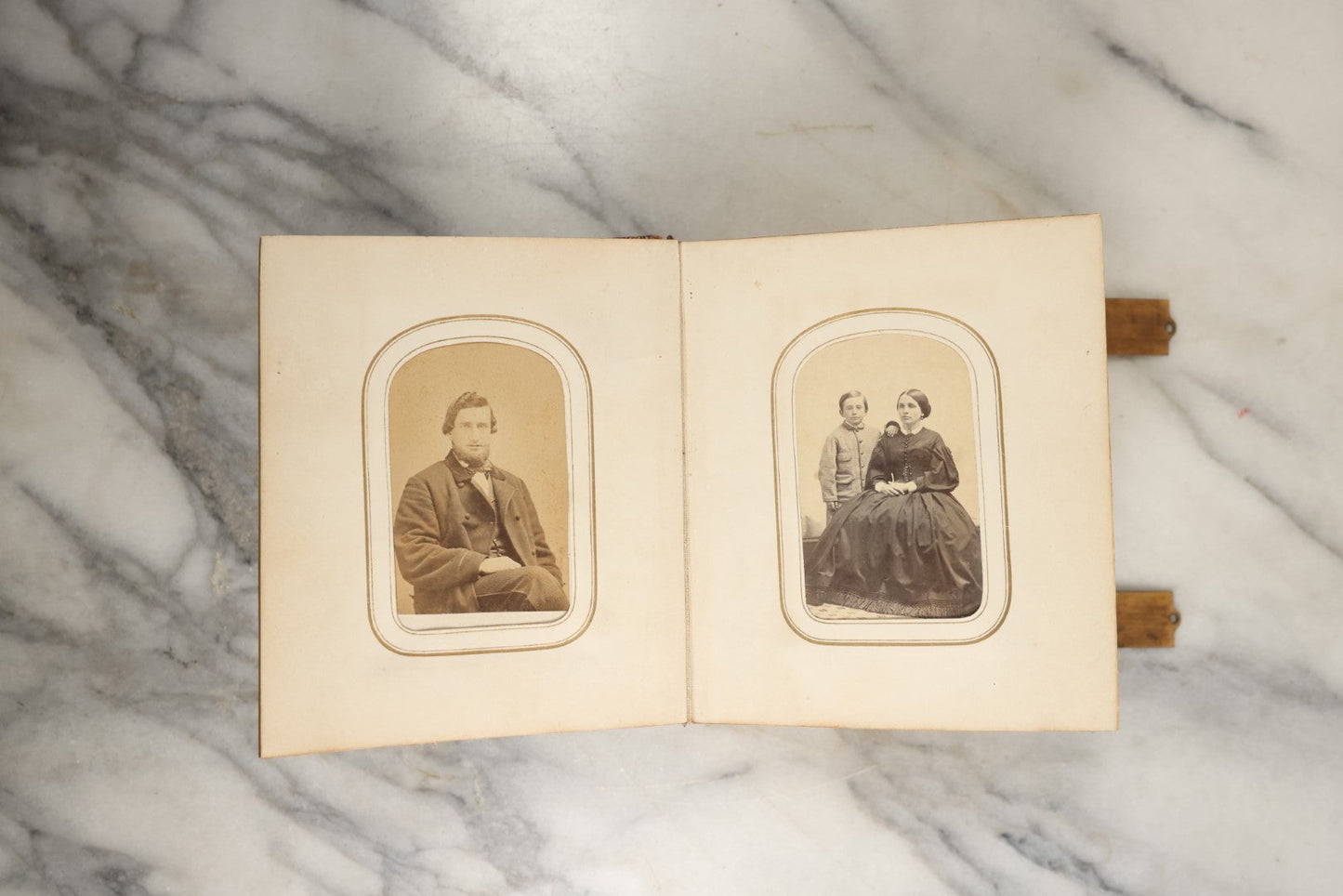 Lot 144 - Antique Photo Album With Gold Lettering On Spine, Gold On Cover, Containing Four Tintypes, 10 Carte De Visite, And 25 Snapshot Photos Of The Patterson Family, 19th / Early 20th Century, Including C.D.V. Of Little Girl Playing Piano (All Pages Included In Pictures)