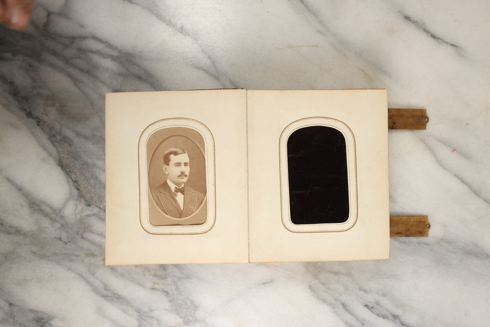 Lot 144 - Antique Photo Album With Gold Lettering On Spine, Gold On Cover, Containing Four Tintypes, 10 Carte De Visite, And 25 Snapshot Photos Of The Patterson Family, 19th / Early 20th Century, Including C.D.V. Of Little Girl Playing Piano (All Pages Included In Pictures)